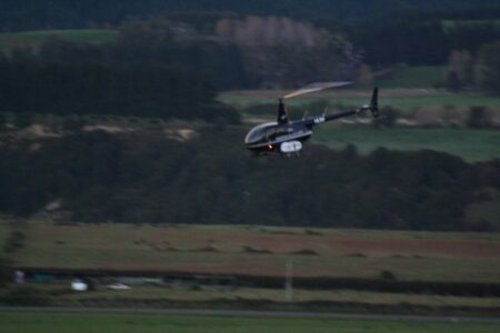 Farm Operations Helicopter Low Flight Dusk